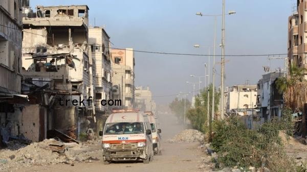 Ambulances transport wounded Palestinians from the Kamal Adwan Hospital to the al-Shifa hospital in Gaza City