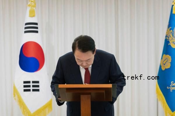 South Korean President Yoon Suk Yeol bows after giving a public address from his official residence in Seoul December 14, 2024. — AFP pic
